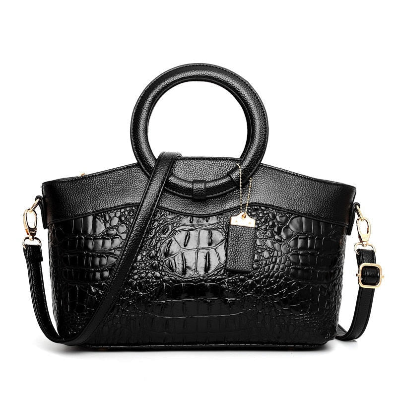 Isabella structured crocodile embossed faux leather top handle bag with two-tone fur trim and detachable strap