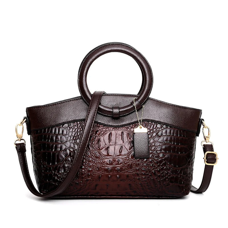 Isabella structured crocodile embossed faux leather top handle bag with two-tone fur trim and detachable strap