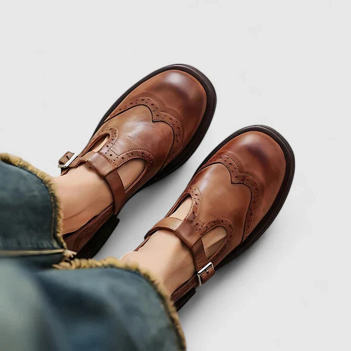 Women's vintage round-toe strap boots in classic brown with retro silhouette and adjustable ankle strap