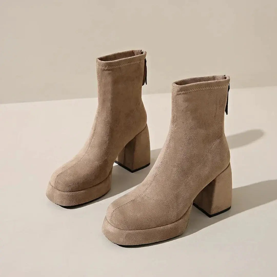 Women's faux suede block heel zip-up ankle boots in neutral tone with plush soft upper