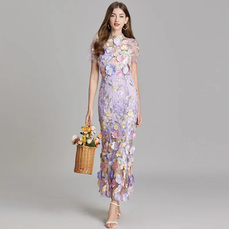 White sheer maxi dress with delicate embroidery, flowing silhouette, lightweight fabric for women