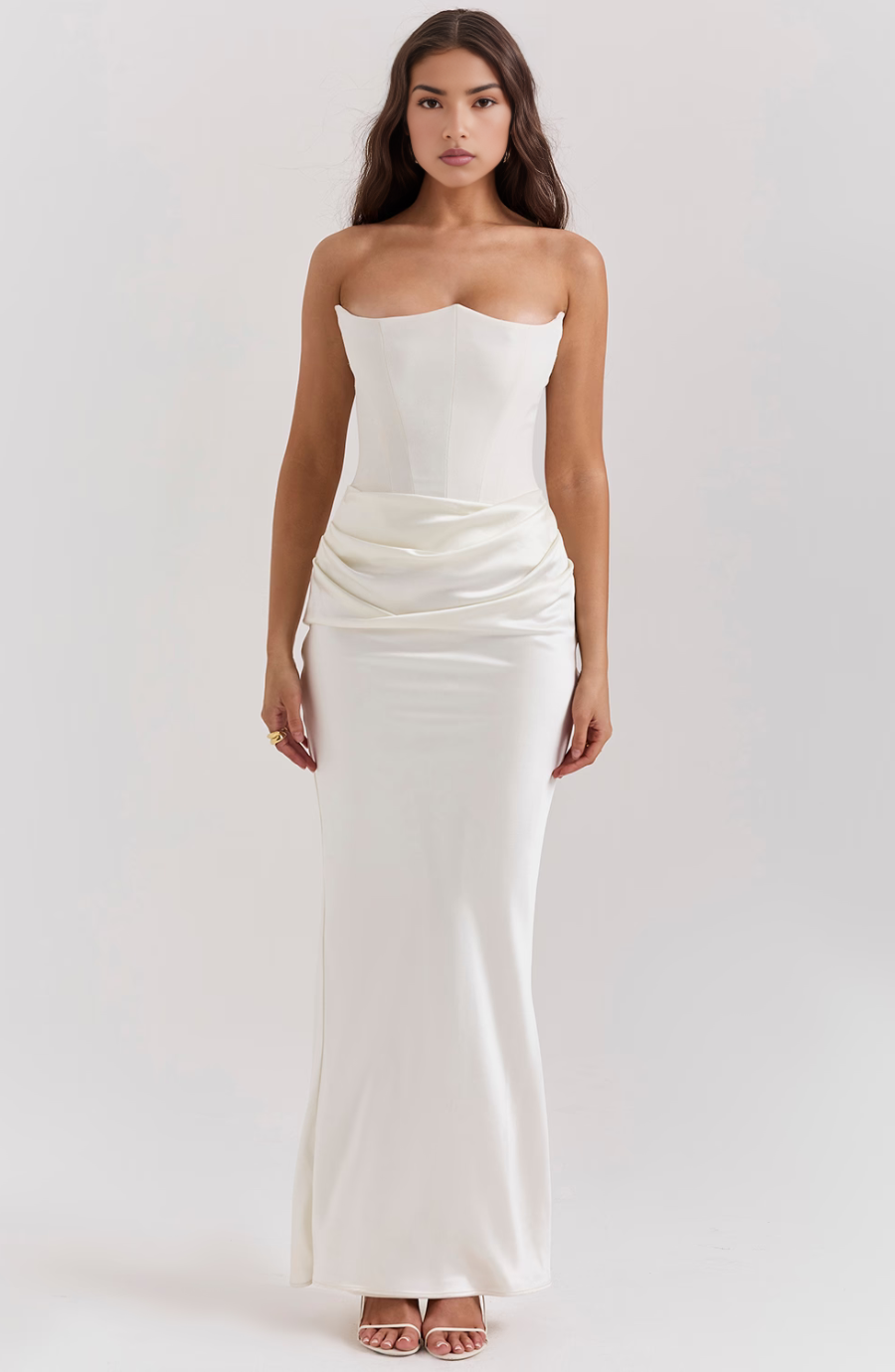 Black strapless corset maxi dress with figure-sculpting waist shaping for elegant evening wear