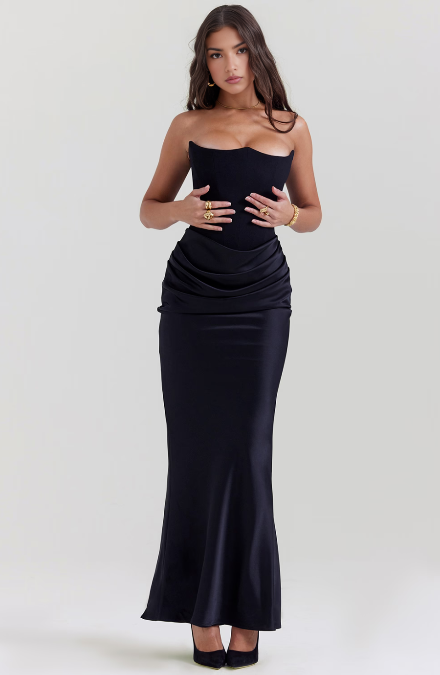 Black strapless corset maxi dress with waist-sculpting silhouette for elegant evening wear