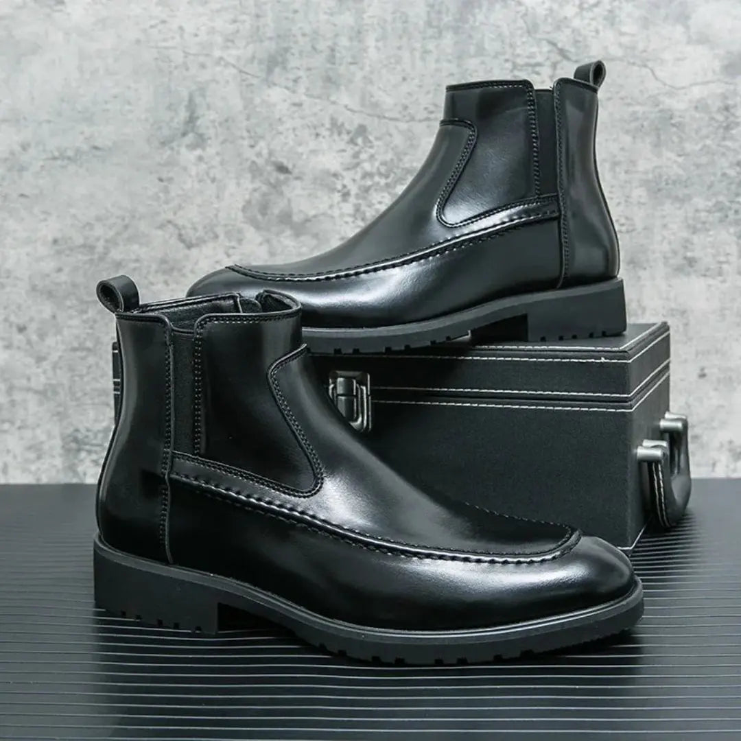 Men's black leather Chelsea boots sleek silhouette elastic side panels formal casual wear