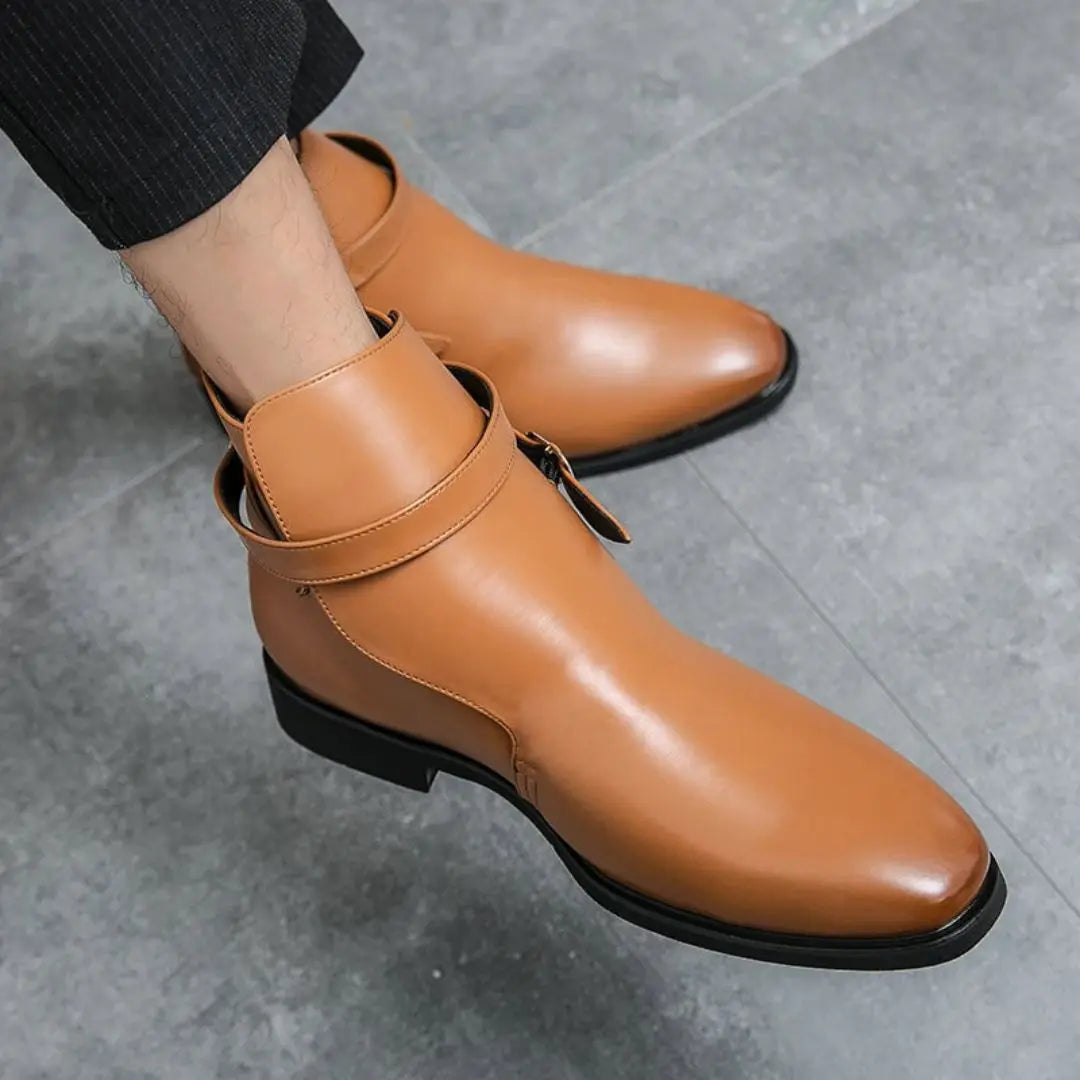Men's brown full-grain leather ankle boots with sleek strap closure and lightweight durable sole