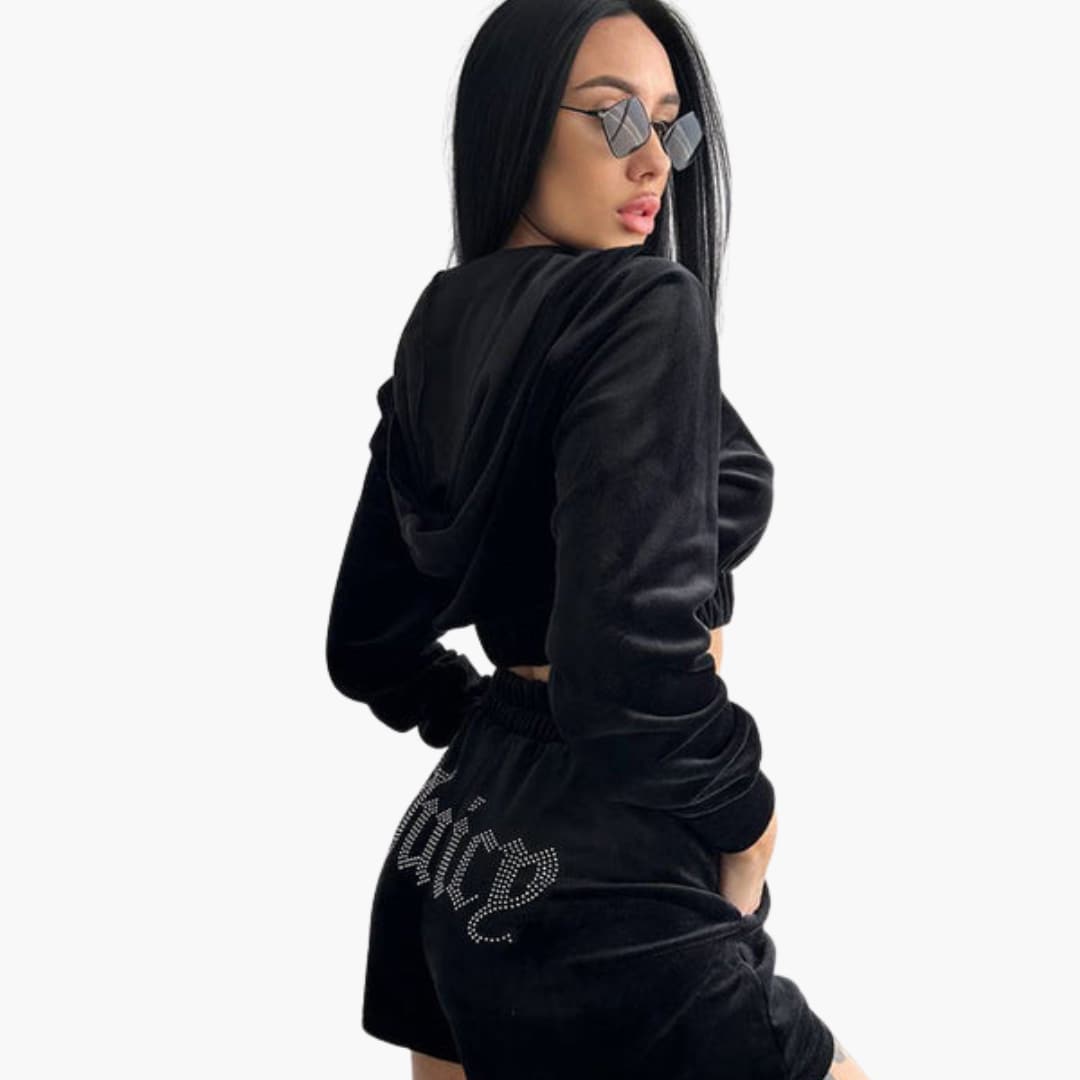 Women's two-piece sports set zip-up high neck top matching pants sleek athletic fit elastic waistband