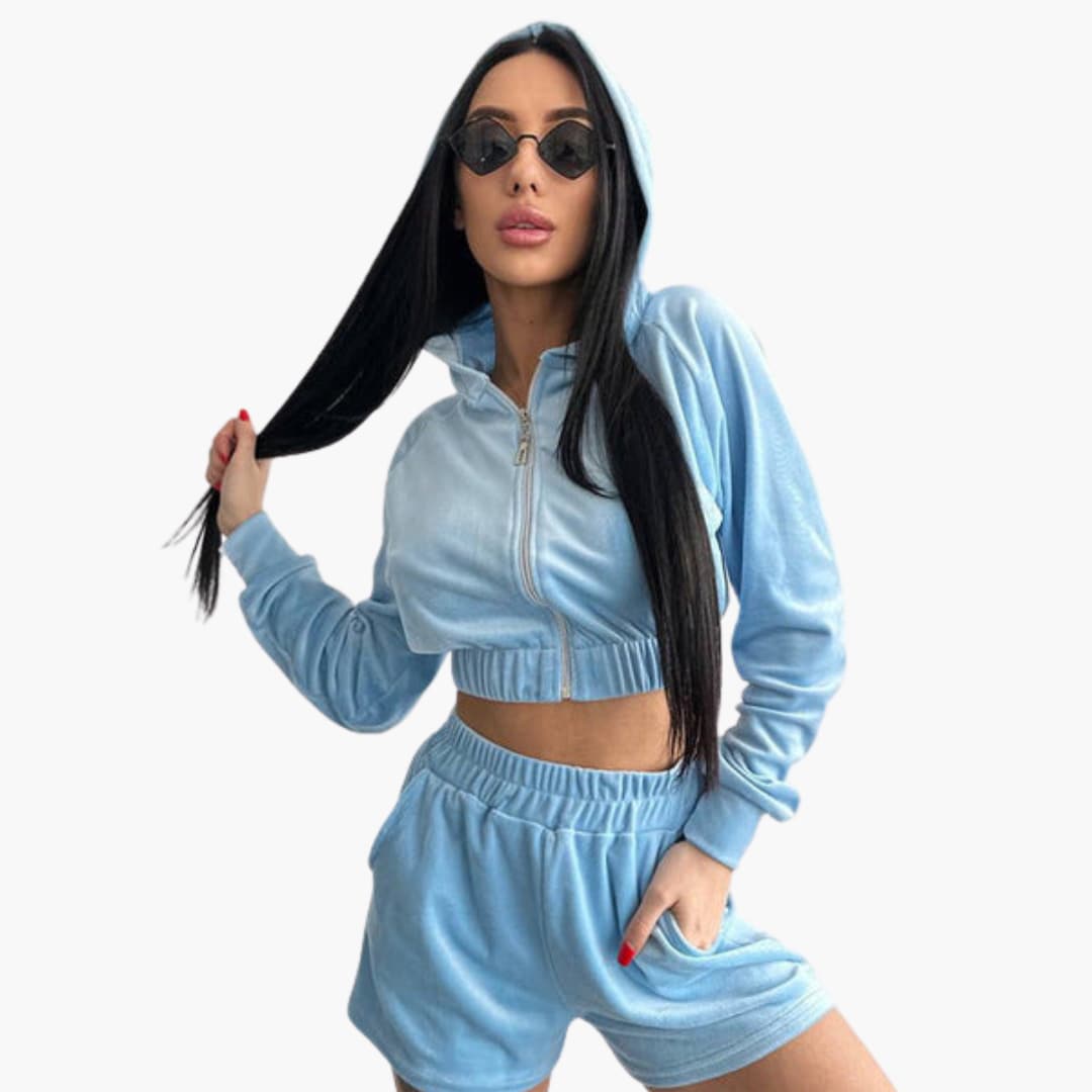 Women's two-piece athletic set zip-up high-neck top matching pants sleek coordinated activewear