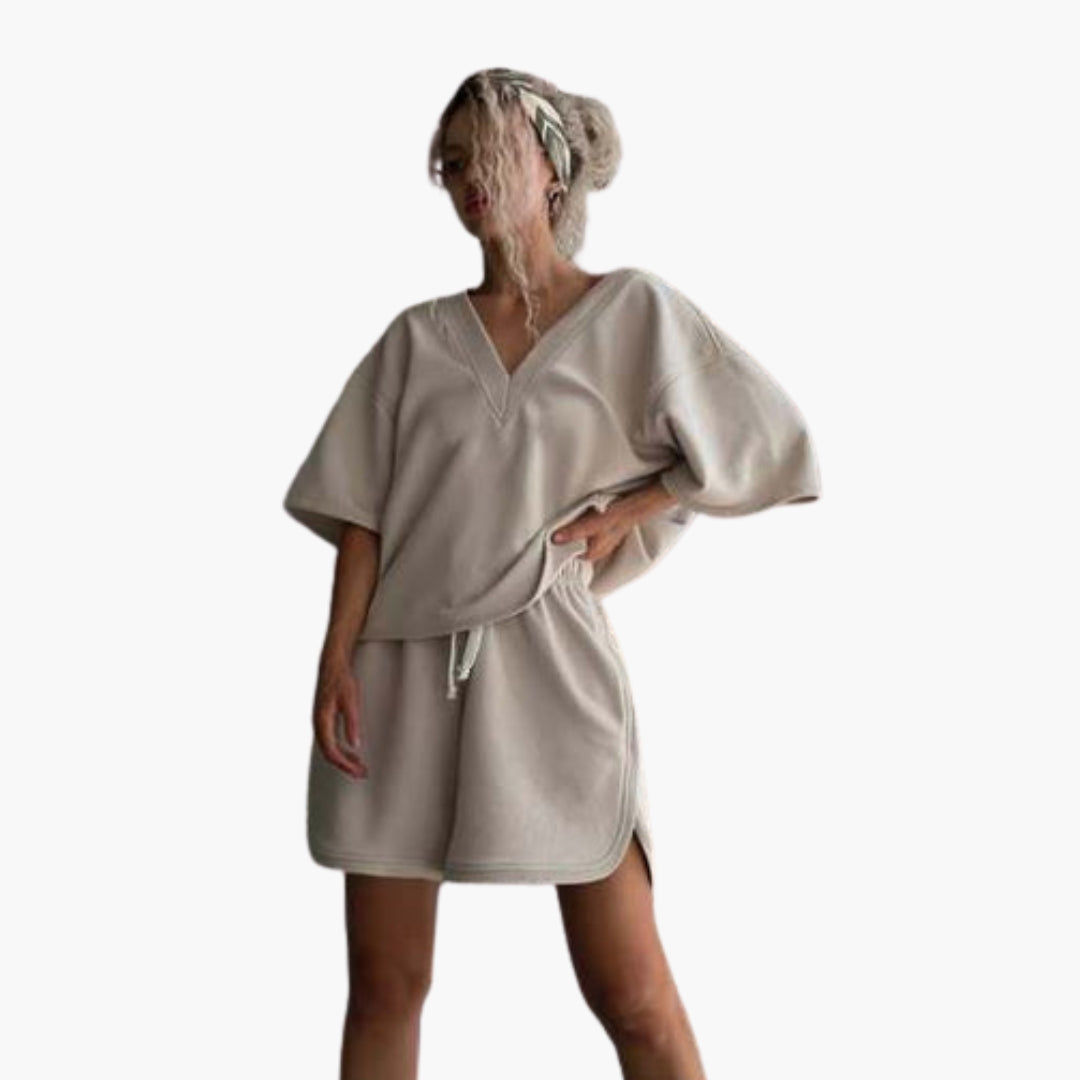 Women's loose V-neck sports set with elastic waist shorts, relaxed fit for active wear