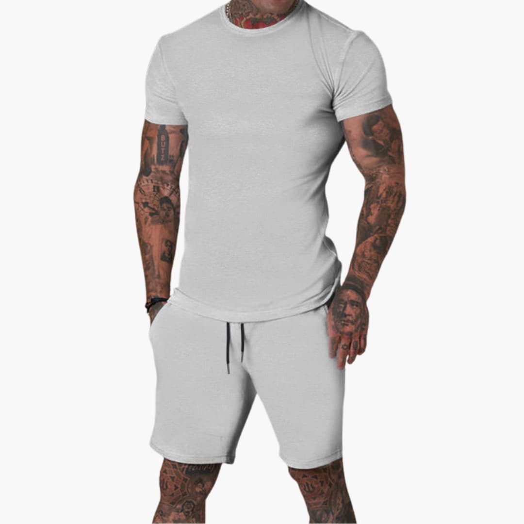 Men's gray short-sleeve sports set with elastic waistband shorts and matching coordinated top