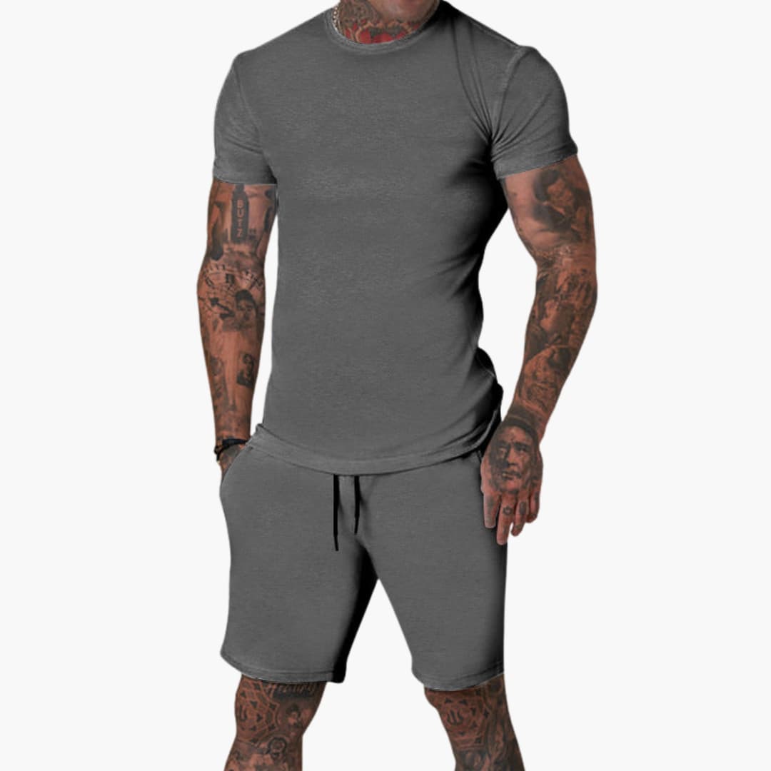 Men's gray short-sleeve sports set with elastic waistband shorts and matching coordinated top