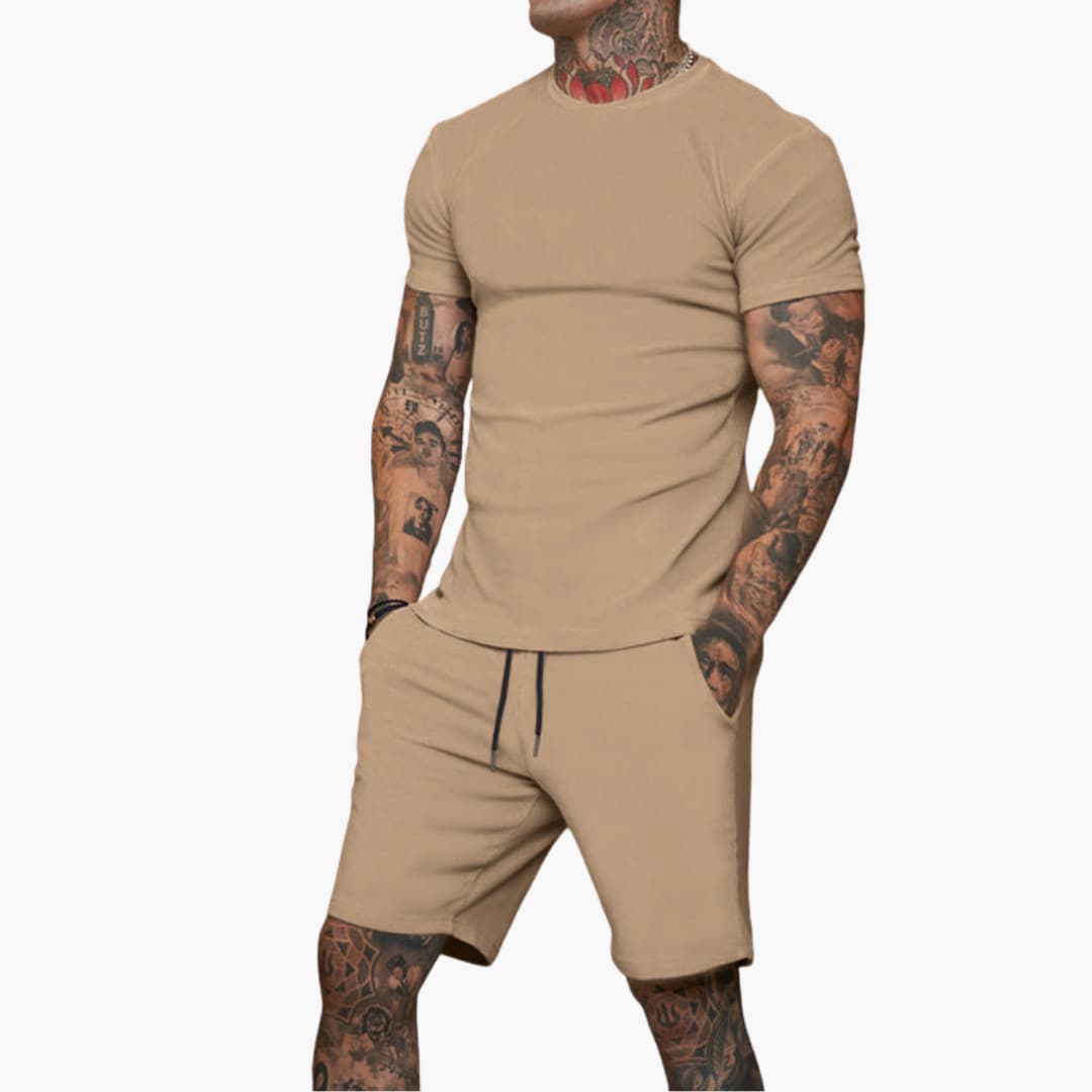 Men's gray short-sleeve sports set with elastic waistband shorts and matching coordinated top