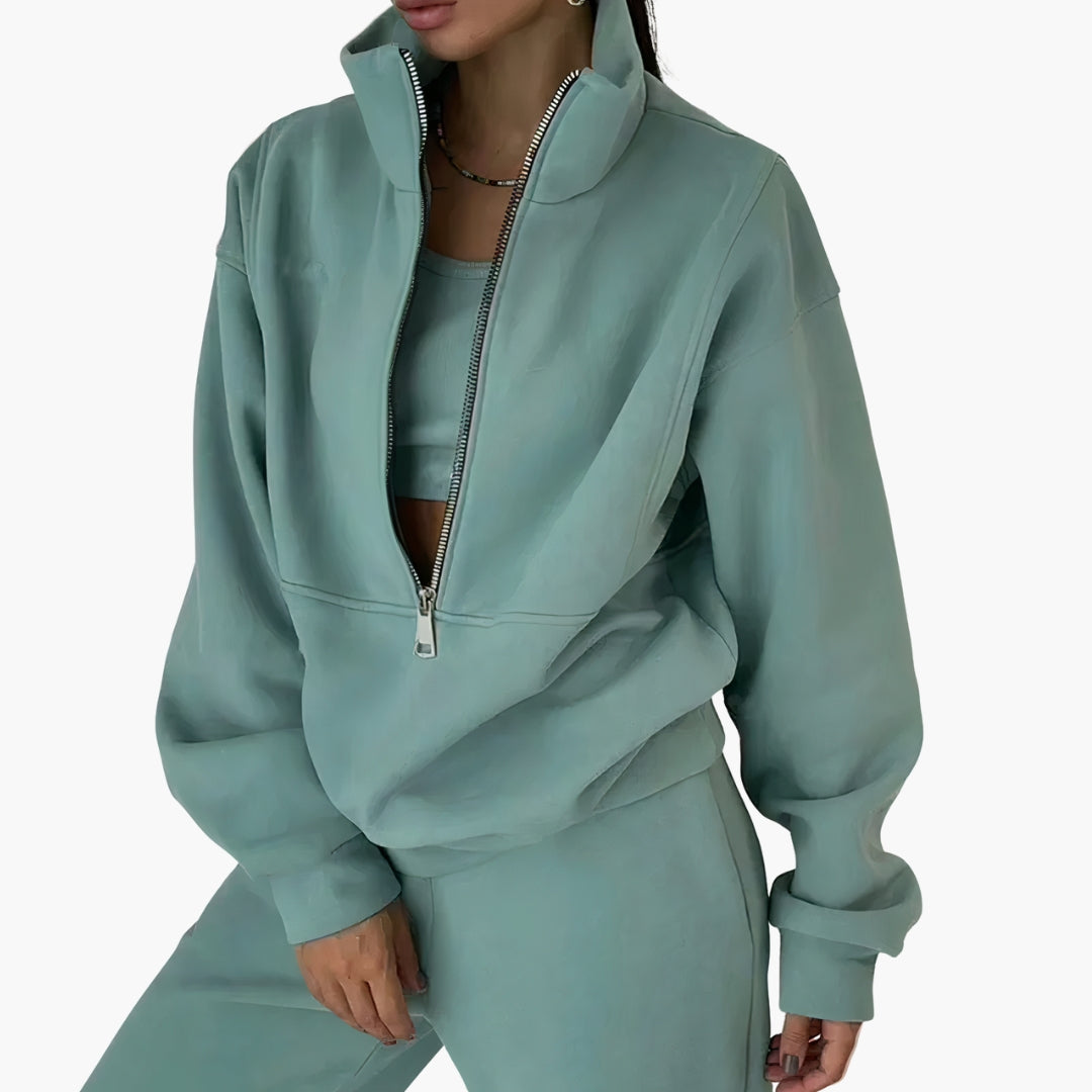 Women's two-piece tracksuit set, half-zip cropped sweatshirt and high-waist joggers, sporty casual style