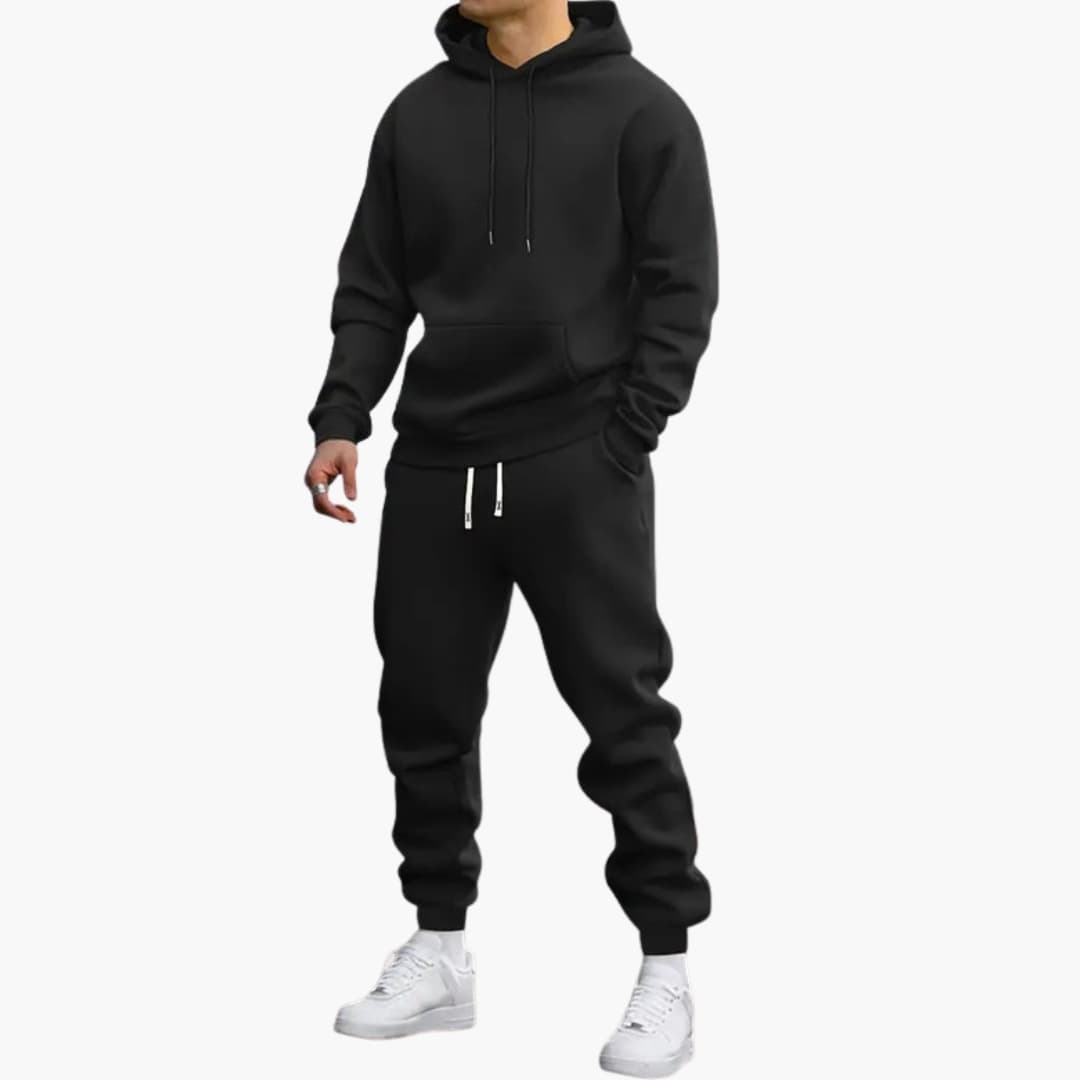 Men's gray two-piece tracksuit set with pullover hoodie and tapered joggers elastic waistband