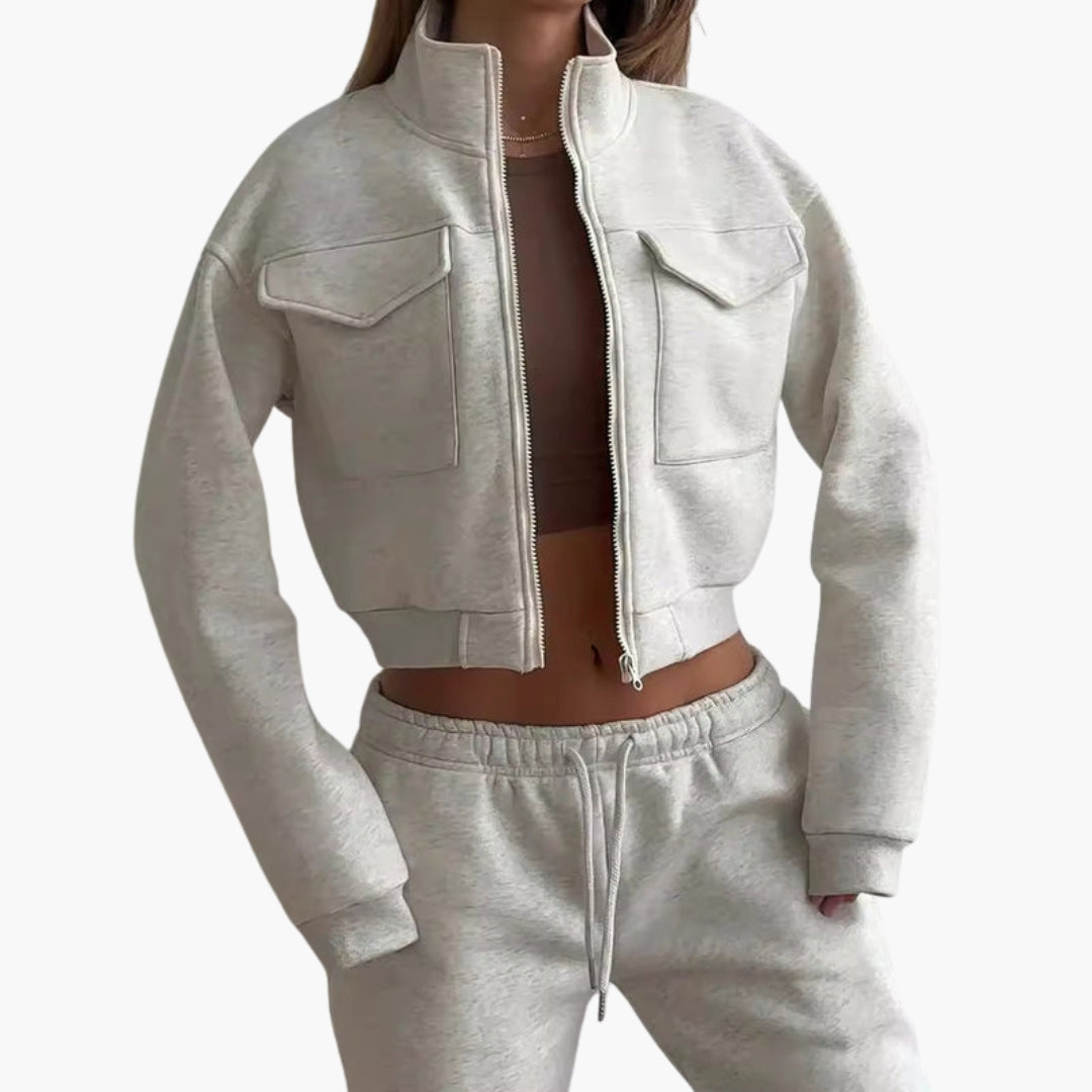 Women's beige zip-up high-neck loungewear set with wide-leg pants and chest flap pockets