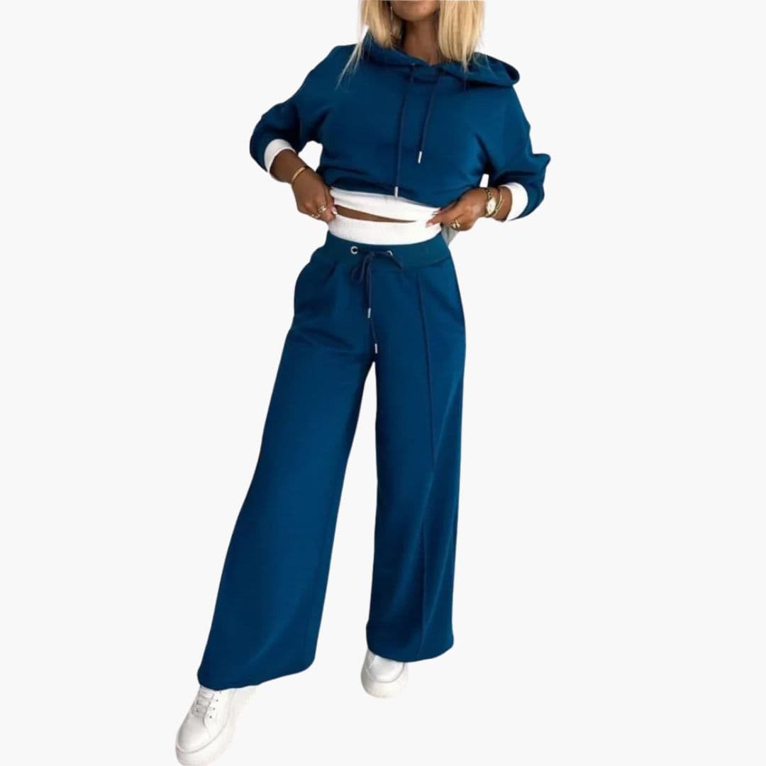 Women's gray hooded two-piece set with wide-leg pants, drawstring waist, relaxed fit, and side pockets