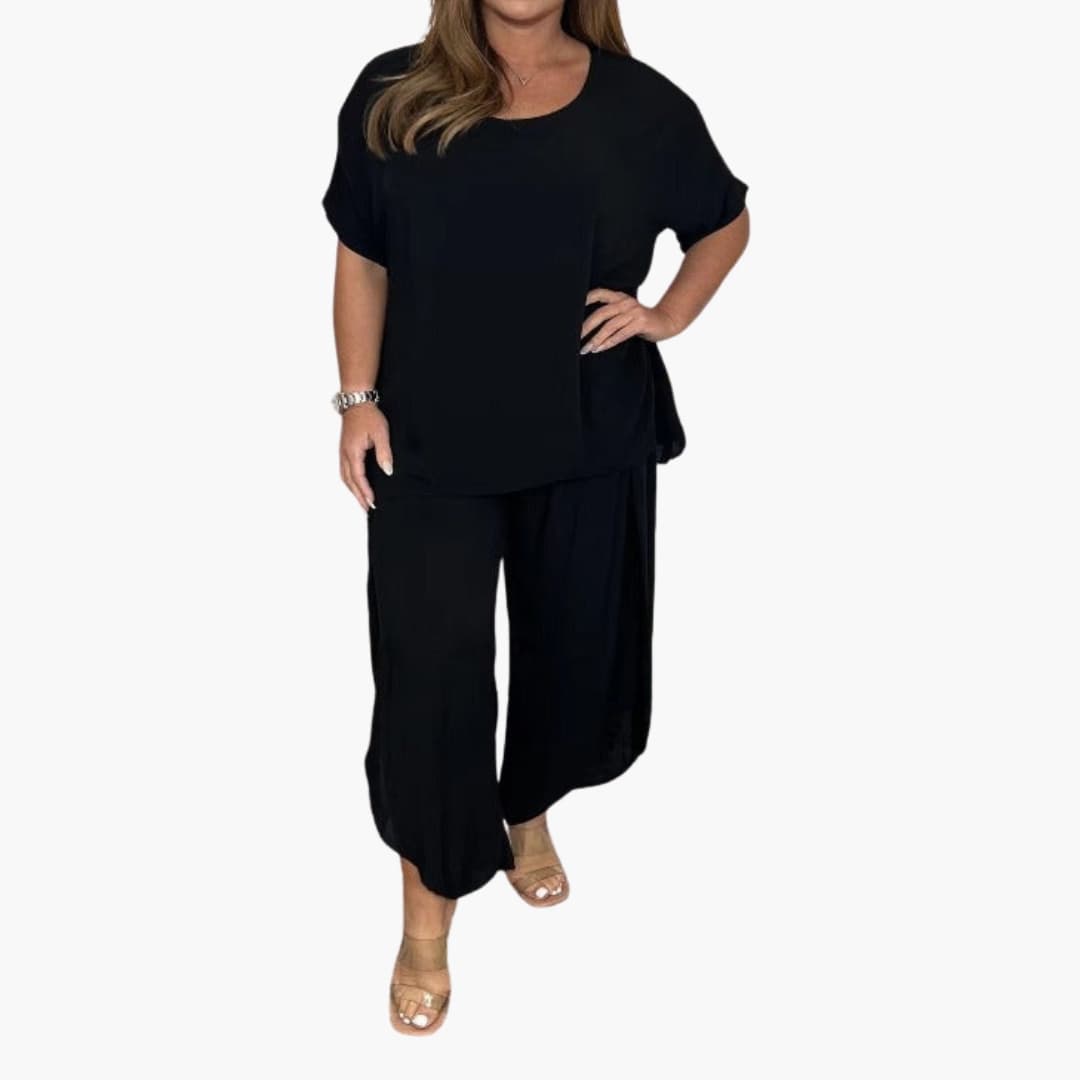 Women's loose two-piece set with wide-leg pants, round neckline, short sleeves, elastic waist