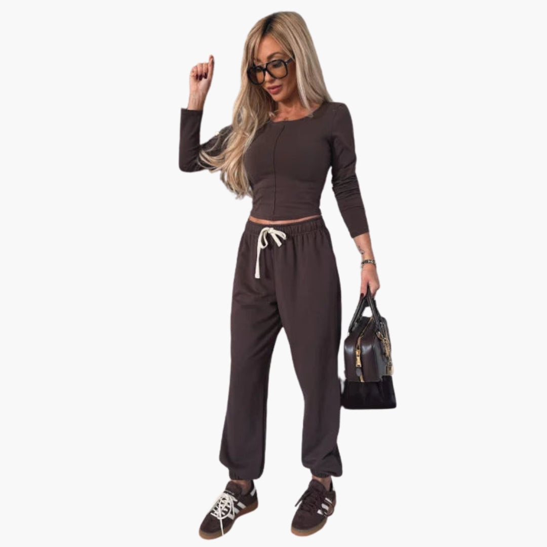 Women's sporty two-piece crop top and wide-leg pants set with elastic waist in solid color