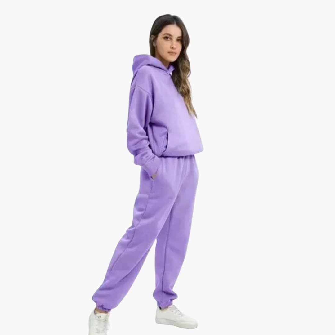 Women's hoodie jogger set with elastic waist, side pockets, and hooded pullover for everyday comfort