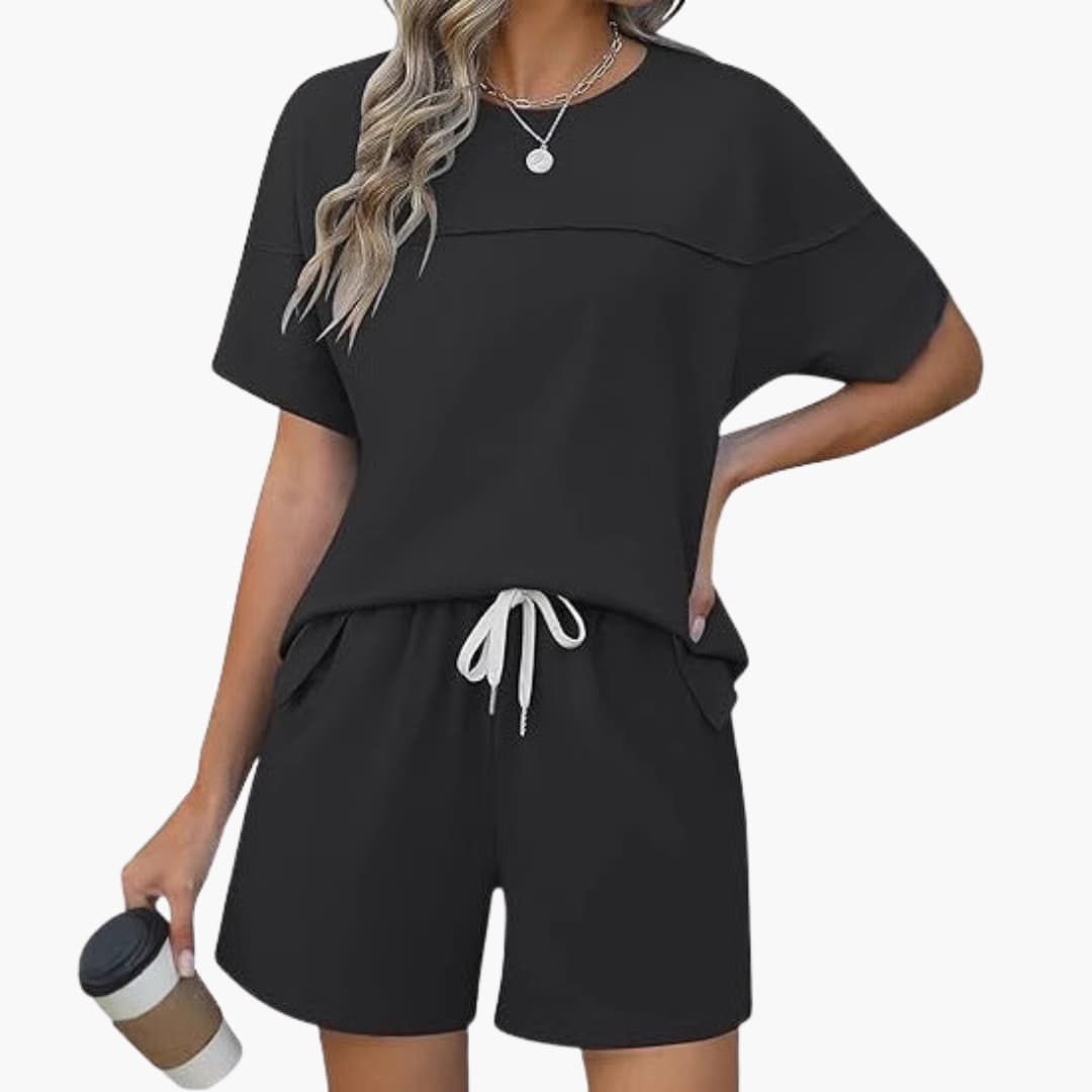 Women's two-piece sportswear set with short-sleeve round-neck top and matching elastic waist shorts activewear