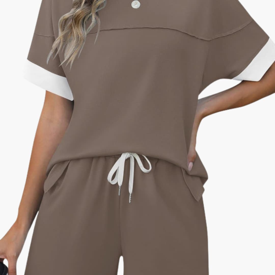Women's two-piece sportswear set with short-sleeve round-neck top and matching elastic waist shorts