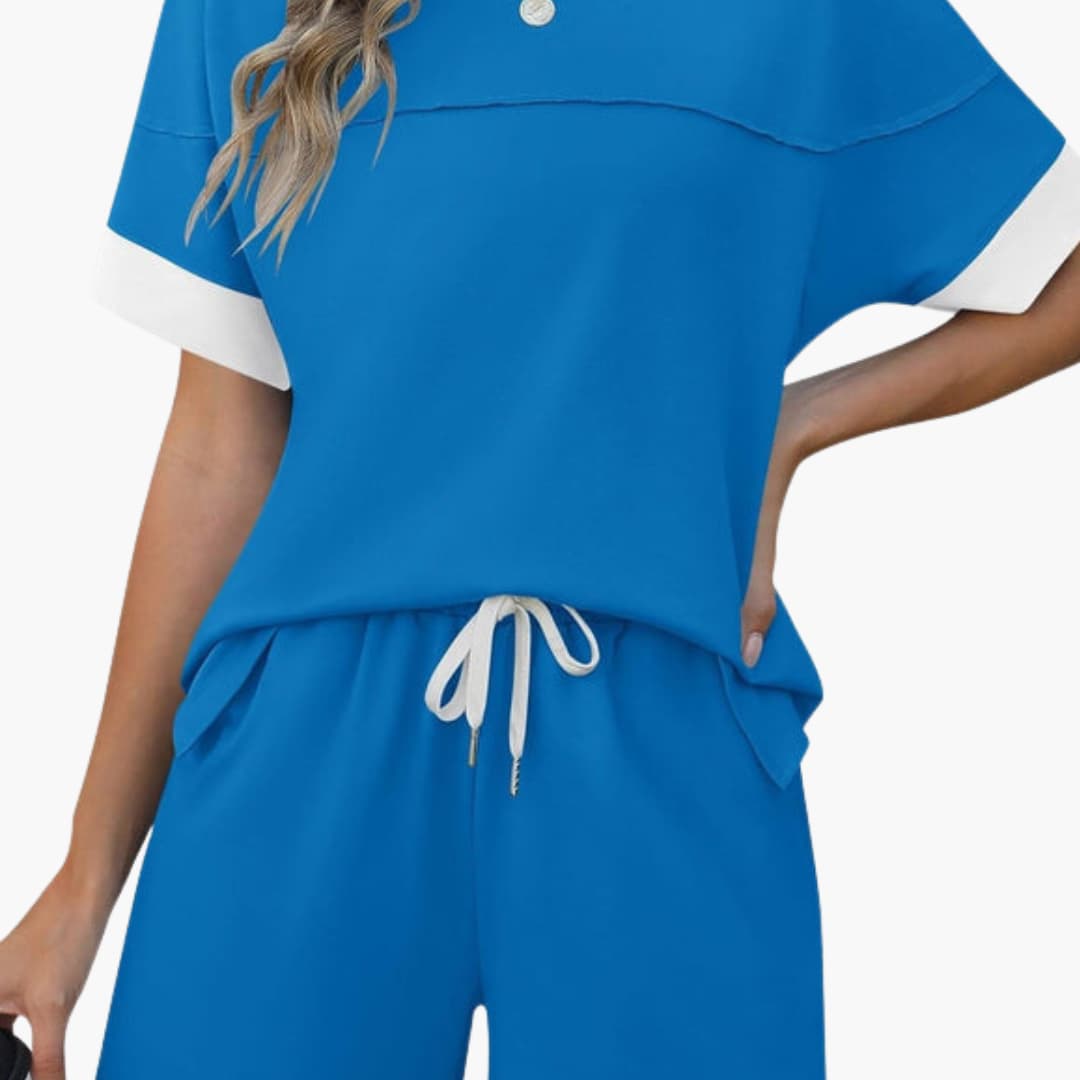 Women's two-piece sportswear set with short-sleeve round-neck top and matching elastic waist shorts