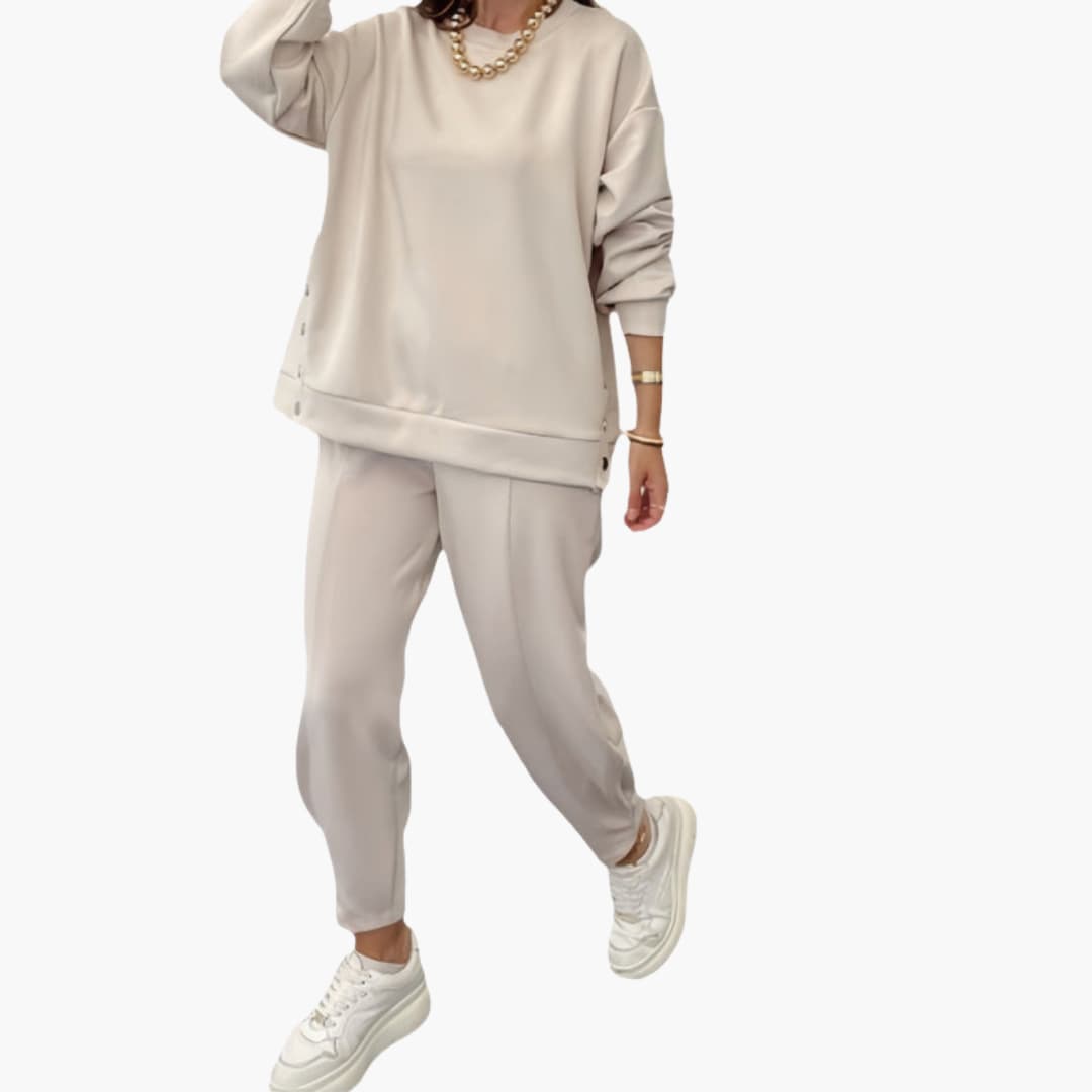 Women's two-piece sports set in loose fit with button detail top and matching pants