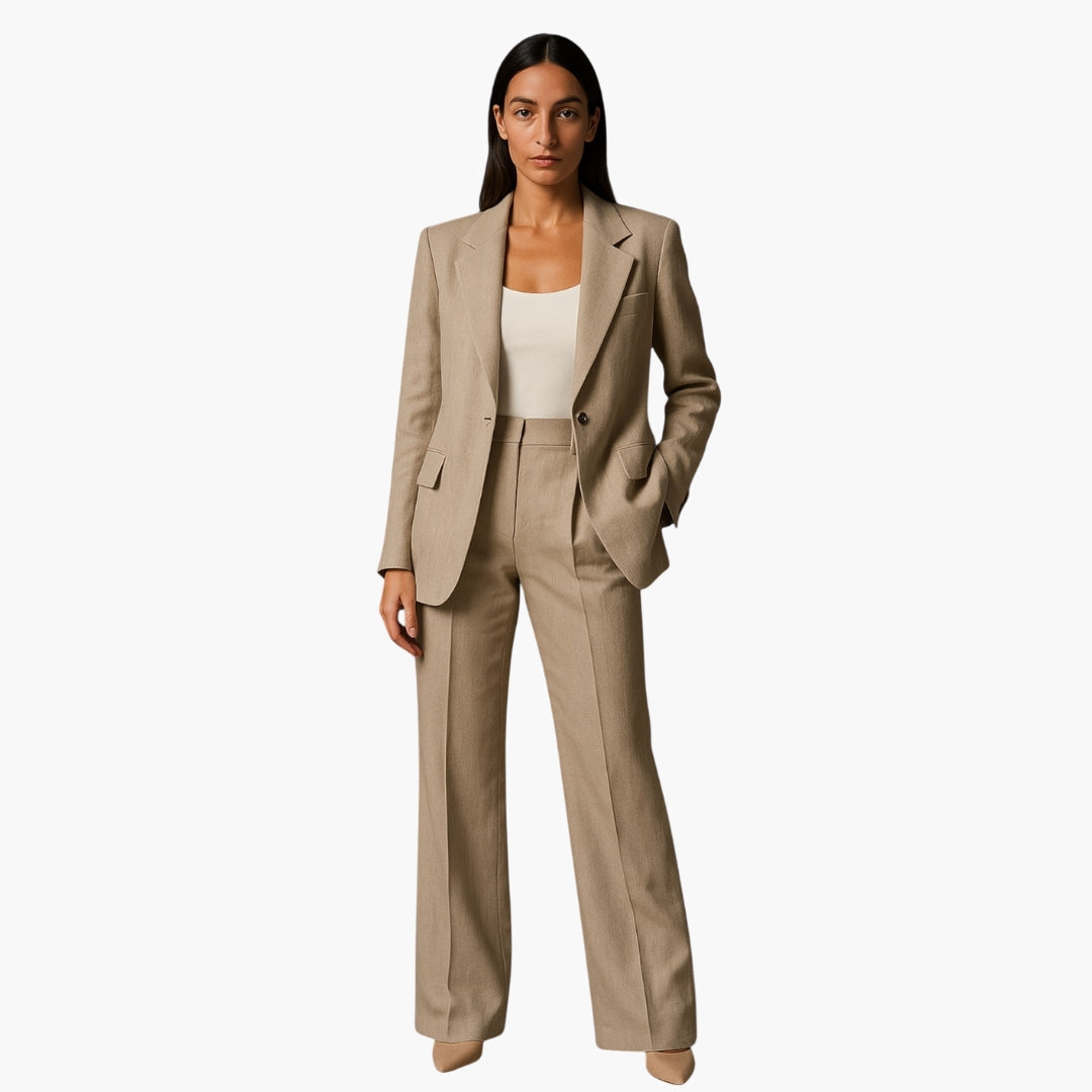 Women's black tailored two-piece suit set with structured notched lapel jacket and wide-leg pants