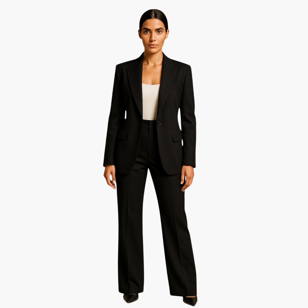 Women's beige tailored two-piece suit set with structured notched lapel jacket and wide-leg pants