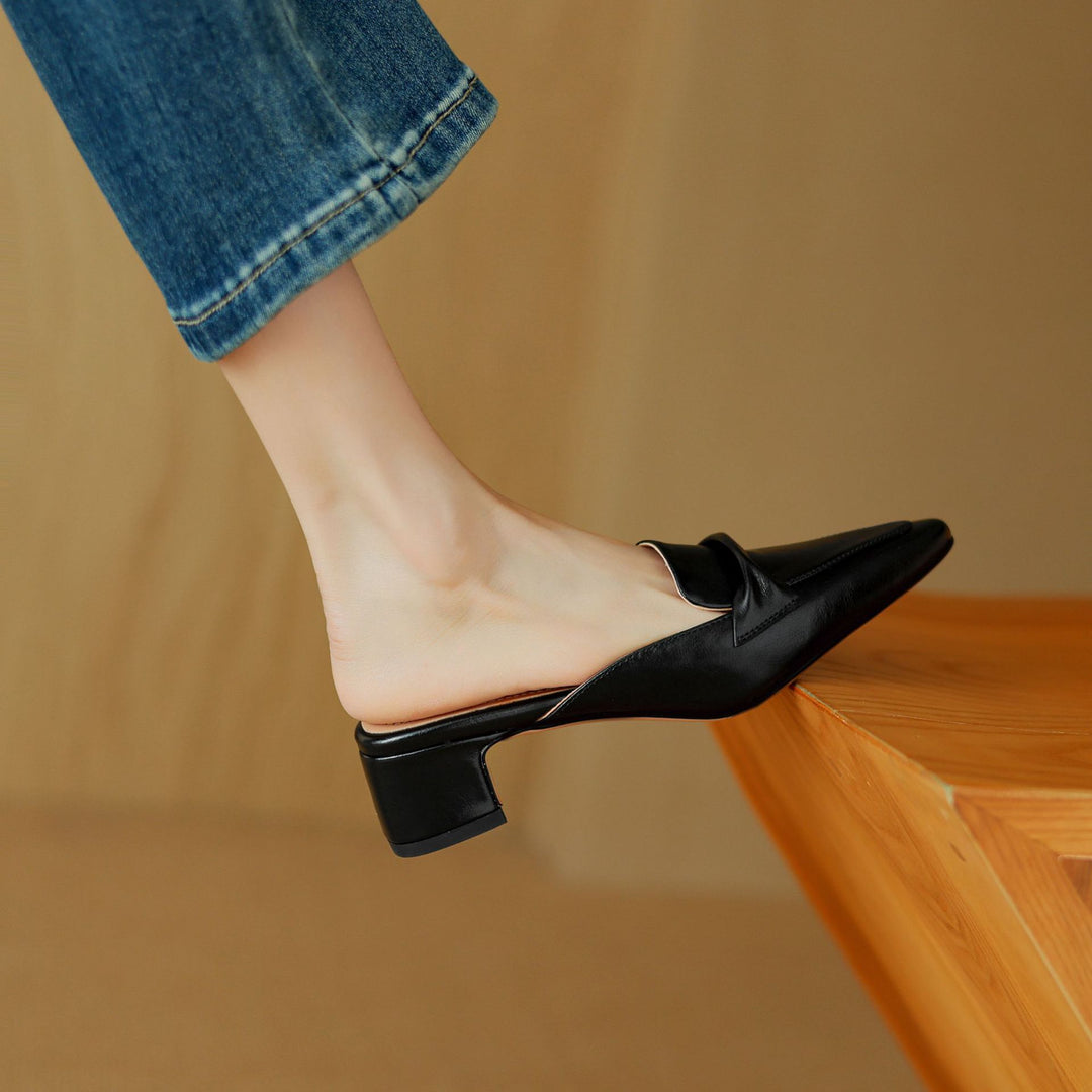 Women's tan leather slip-on mules with bow-trim detail and breathable premium upper, desk-to-dinner style