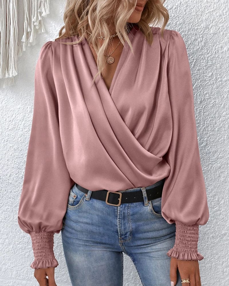Women's elegant long sleeve wrap blouse with draped crossover front and shirred cuffs, day-to-night style