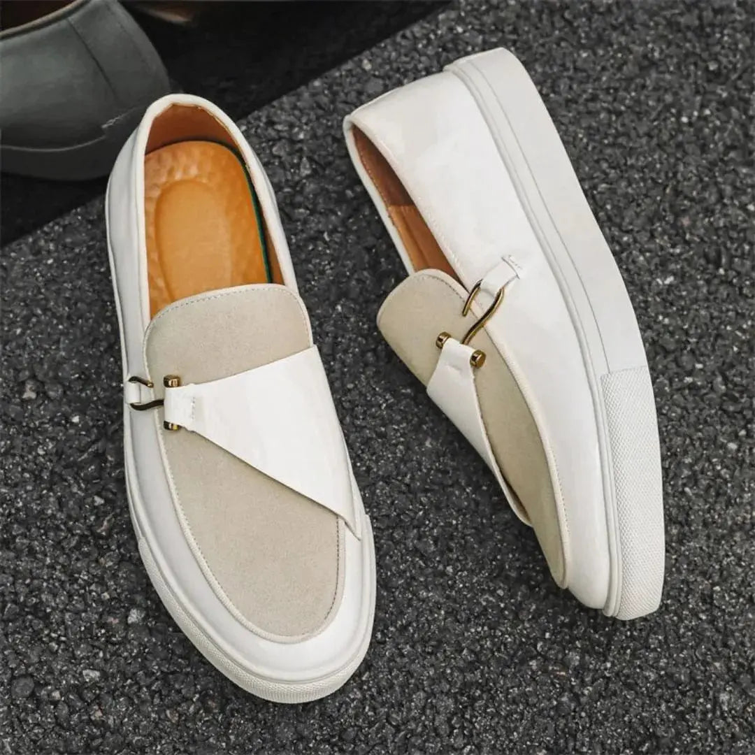 Men's black penny loafers sleek sculpted silhouette luxe runway style with gold-tone detail