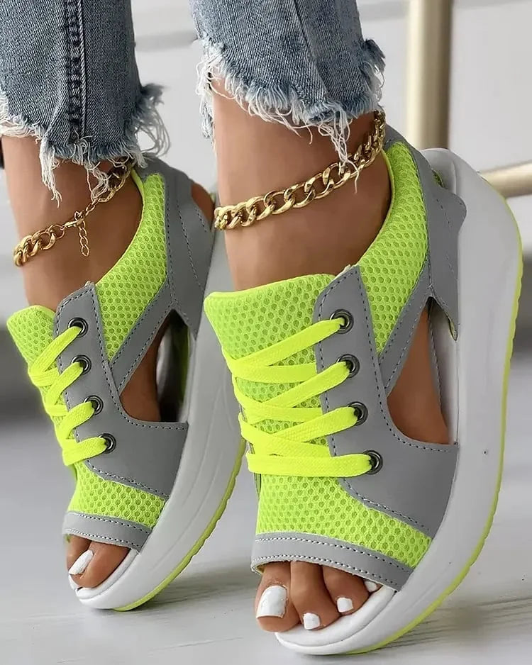 Women's sporty wedge sandals with breathable mesh upper, lace-up closure, athletic-inspired casual style