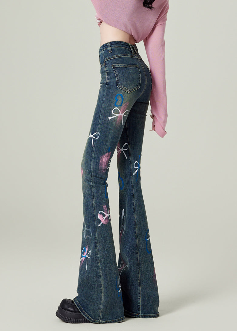 Pantalon évasé en denim bleu à poches et nœuds pour le printemps - Urbann-Vibe