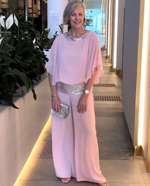 Elegant women's two-piece evening set in meadow tones, coordinated top and bottom for formal occasions