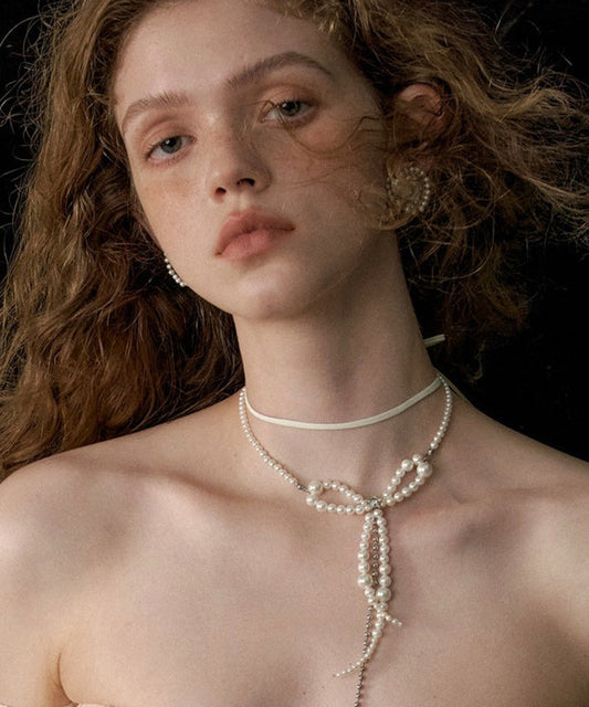 Collier à double pendentif en alliage blanc avec nœud en perles et pompon - Urbann-Vibe