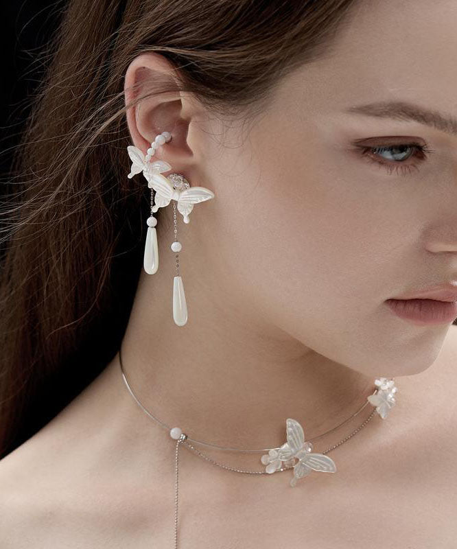 Boucles d'oreilles pendantes en argent sterling blanc avec perles et papillon - Urbann-Vibe