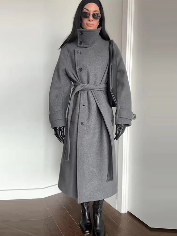 Women's winter belted trench coat structured silhouette waist-defining long elegant outerwear