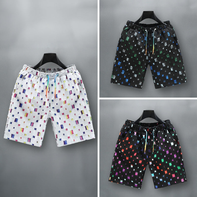 Felix Grant colorful cotton denim shorts with frayed hem, bold vibrant hues, urban street style fit