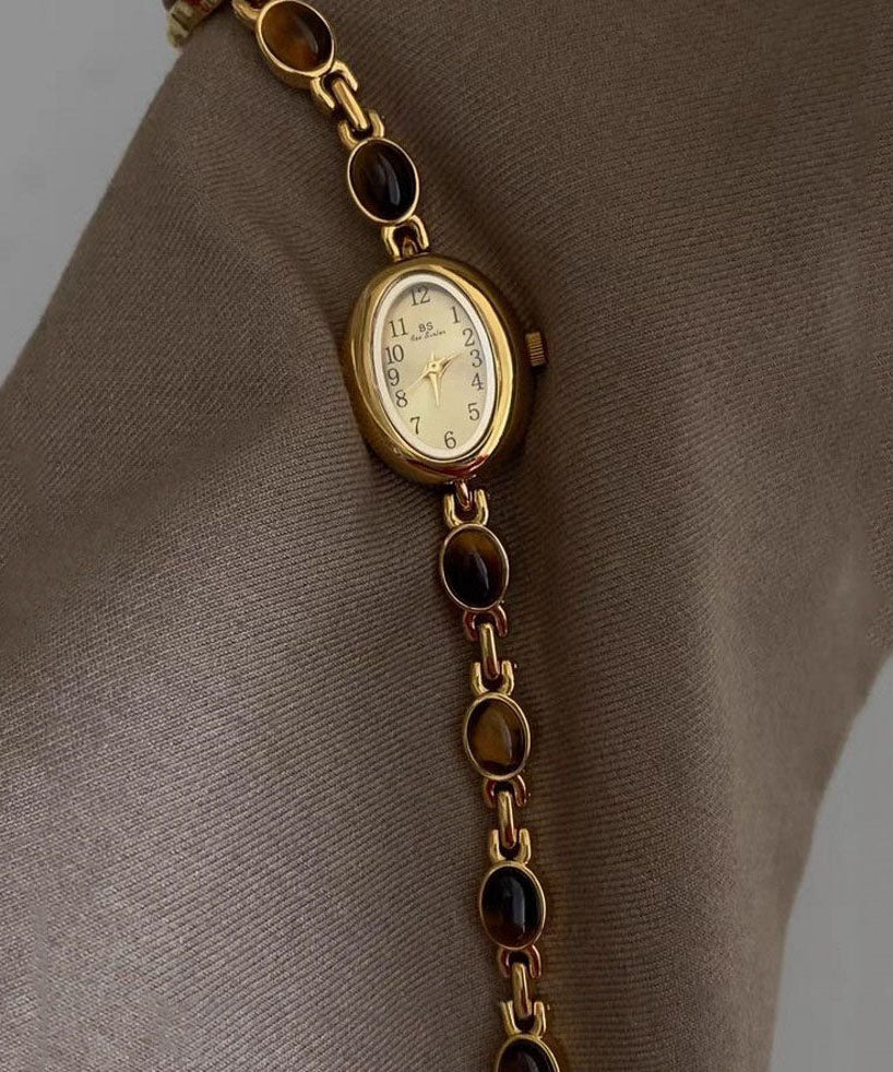 Montres à mouvement à quartz en verre trempé et alliage métallique doré fin - Urbann-Vibe