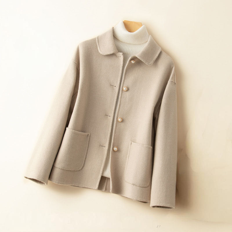 Women's lightweight 100% cashmere knit jacket with spread collar and button-front, elegant drape