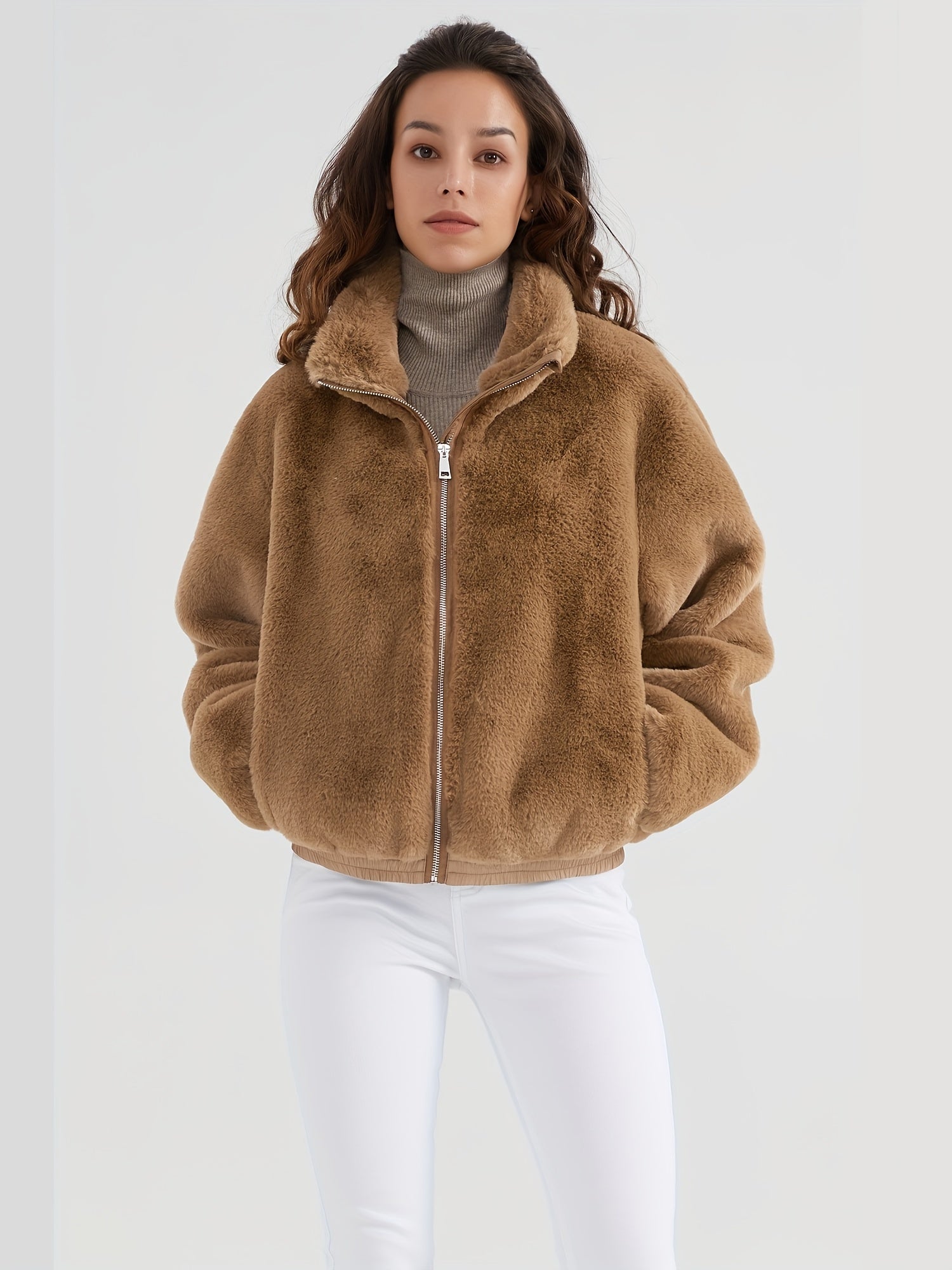 Women's fluffy fleece winter jacket with high collar, cozy warmth, durable zipper, cold weather style