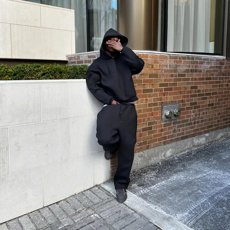 Men's minimal gray hooded sweater coordinated set with clean streamlined silhouette for travel