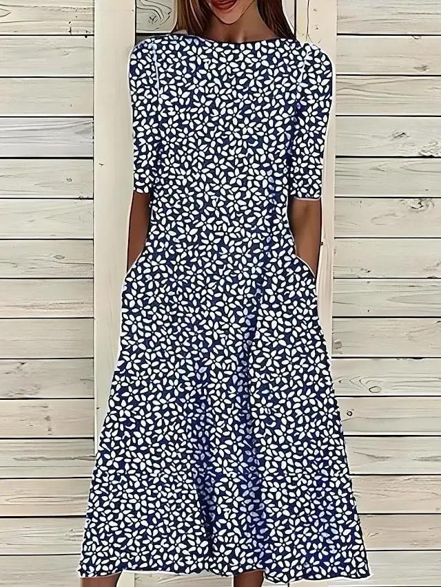 Women's floral A-line midi dress in vibrant botanical print, lightweight breathable fabric for effortless elegance