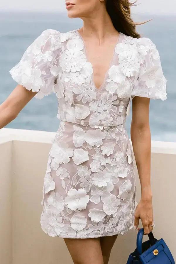 Women's floral embroidered mini dress, V-neck puff sleeve lightweight summer style with stitched floral details