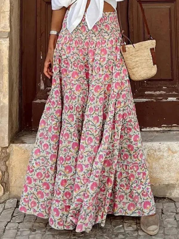 Women's boho floral print maxi skirt, flowing silhouette in vibrant multicolor pattern for summer
