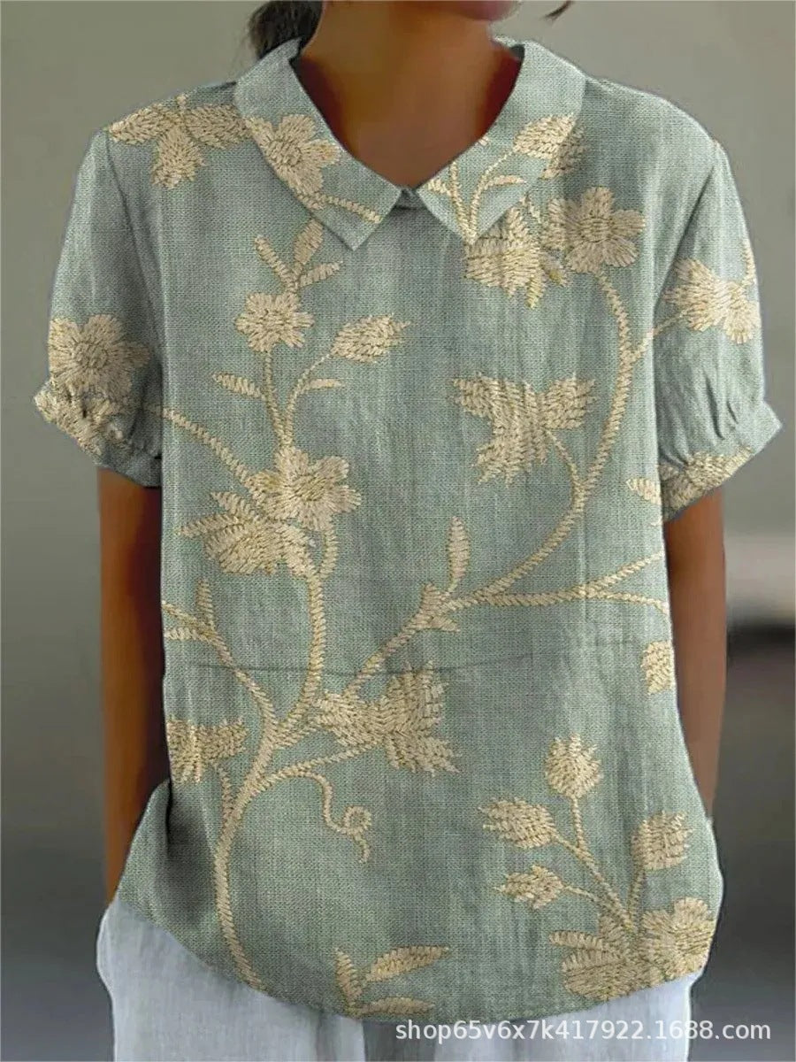 Women's loose-fit floral print blouse, lightweight breathable fabric in soft feminine colors