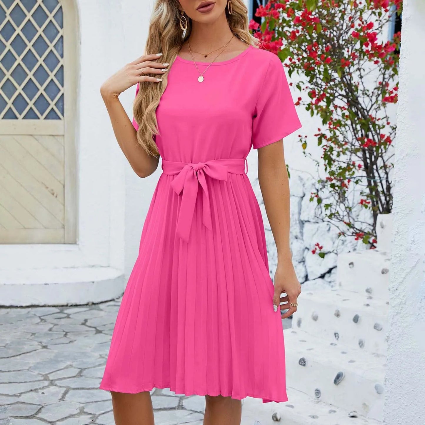Women's mint green pleated dress with sustainable fabric, refined silhouette, and fresh everyday style