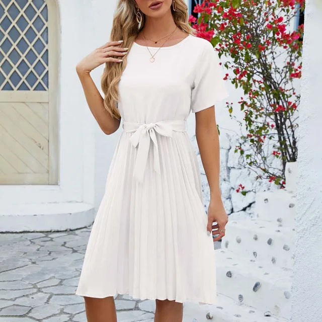 Women's mint green pleated dress with sustainable fabric, relaxed silhouette and fresh everyday style