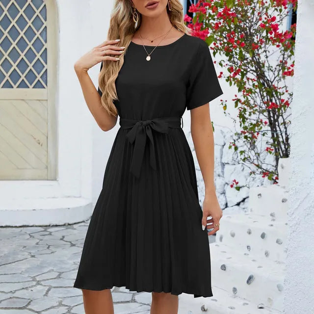 Mint green pleated midi dress for women with sustainable fabric and elegant flowy silhouette