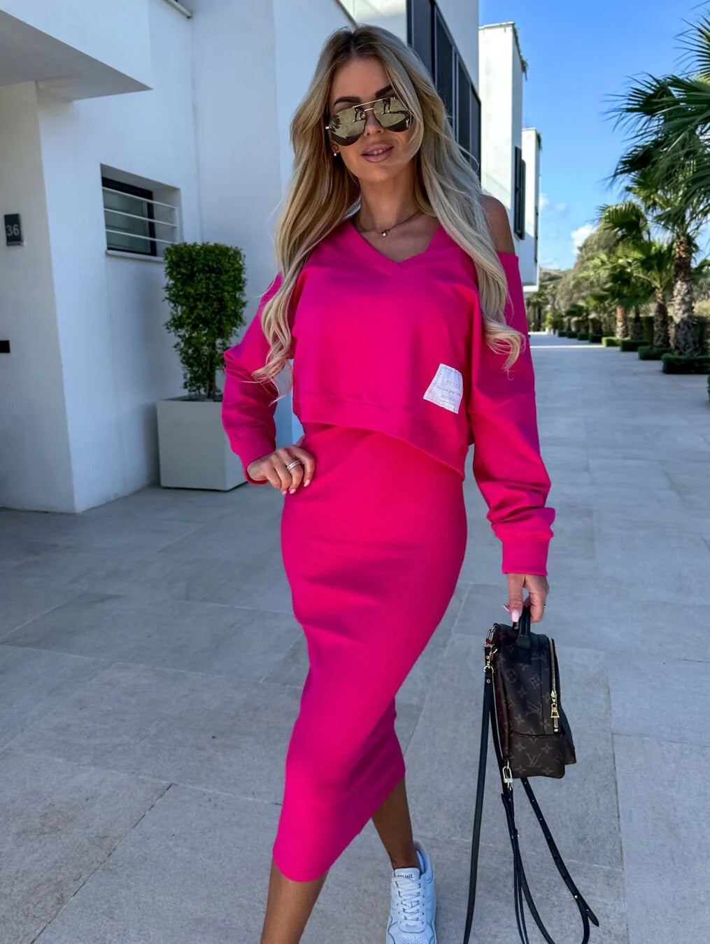 Women's two-piece black crop top and bodycon midi skirt set long sleeve V-neck high-waisted stretch